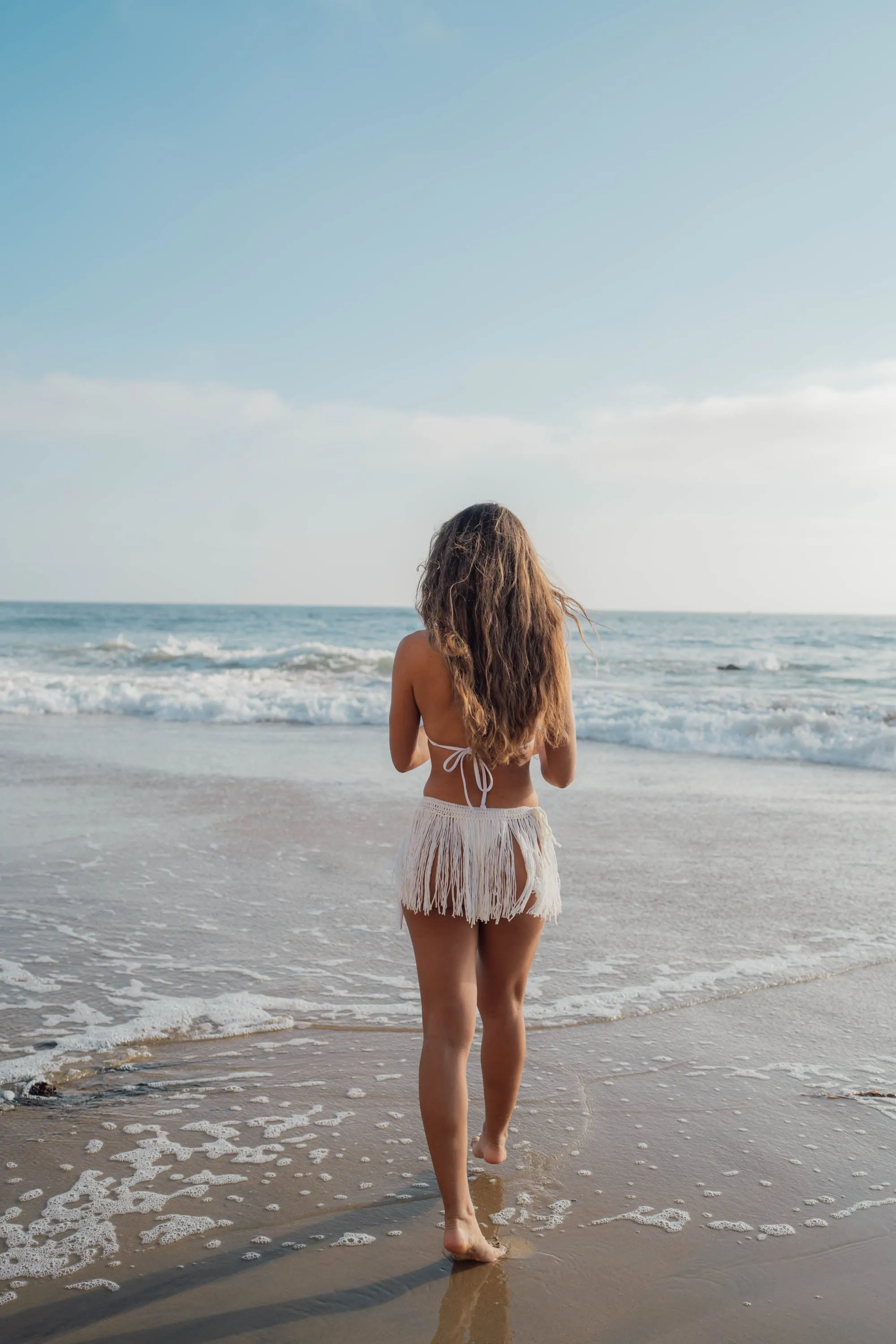 Doris in White Fringe Coverup Skirt